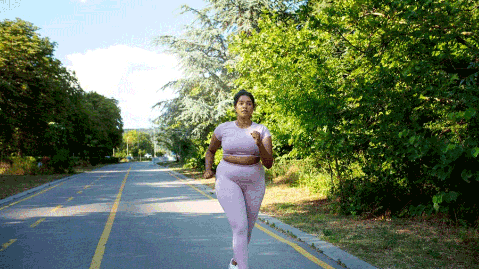 overweight woman with pcos jogging