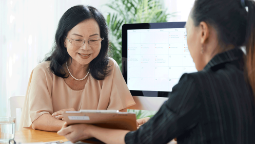 woman experiencing menopause consulting a doctor